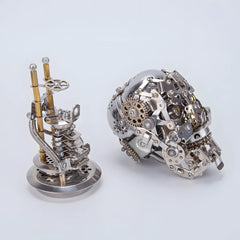 A view of the Cybernetic Skull model disassembled into its two main parts, the head and the mechanical neck base, on a white background