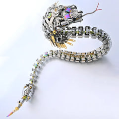 The 80cm long Mechanical Cobra in a graceful coiled S-pose, emphasizing the highly detailed spine and snake head