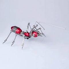 The red and gold variant of the Steampunk 3D Metal Puzzle ant model, showcasing the glossy red body segments and silver limbs