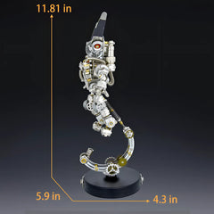 Side profile of the astronaut robot with dimension labels: 11.81 in height and 5.9 in base length, emphasizing its finished size