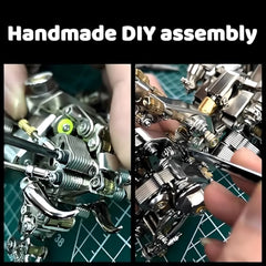 Hands assembling the DIY Mechanical Diver kit, demonstrating the intricate process of connecting small metal parts and joints.