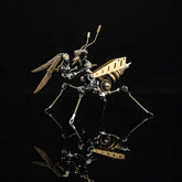 The Steampunk Mantis 'The Stalker', a beginner DIY mech kit, shown from the side on a black reflective surface