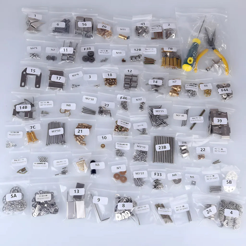 Top-down view of the comprehensive DIY kit contents, showing bags of small parts, gears, screws, and included assembly tools