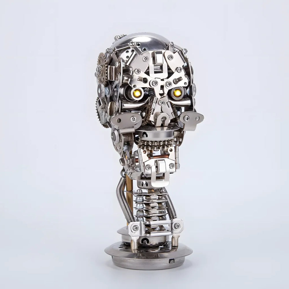 he Cybernetic Skull Initiate metal model kit with its yellow LED eyes illuminated on a clean white background