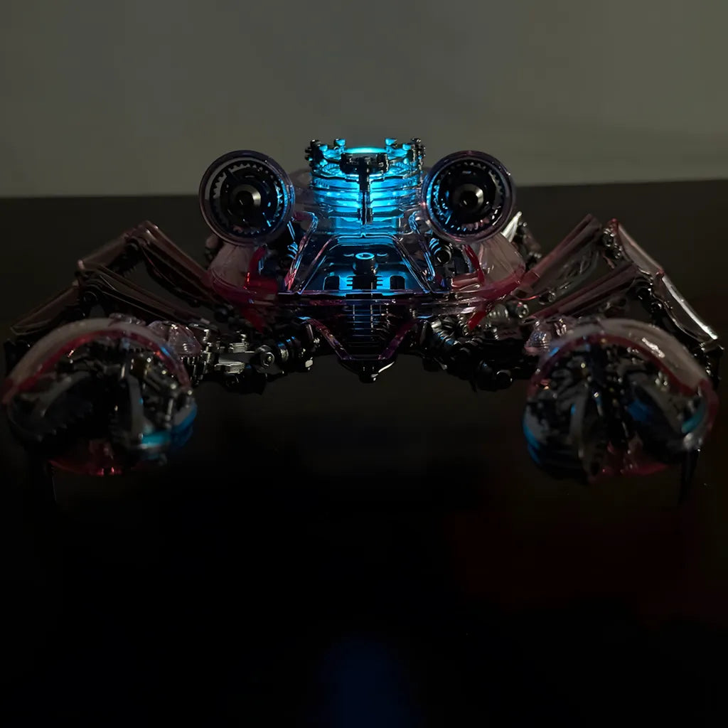 The Cyberpunk Crab model in a dark setting, with its central blue LED core glowing intensely through its red-tinted armor