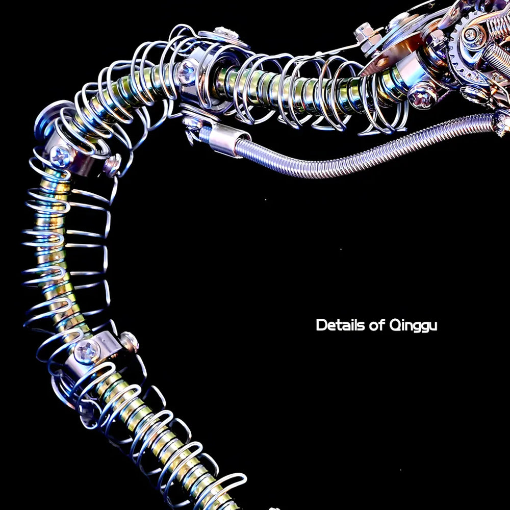 Detailed view of the snake's tail end, showcasing the articulated rattle and the complex spring body design.