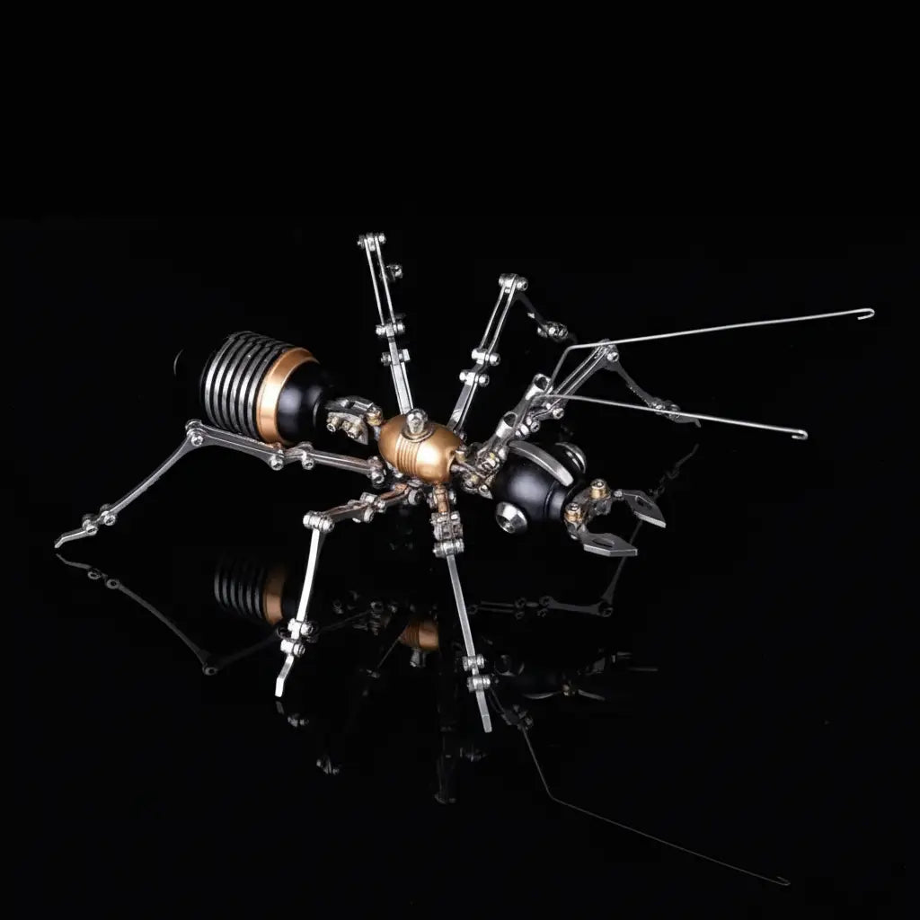 The black and gold DIY robot ant model, highlighting its intricate articulated legs and coiled abdomen on a dark background.