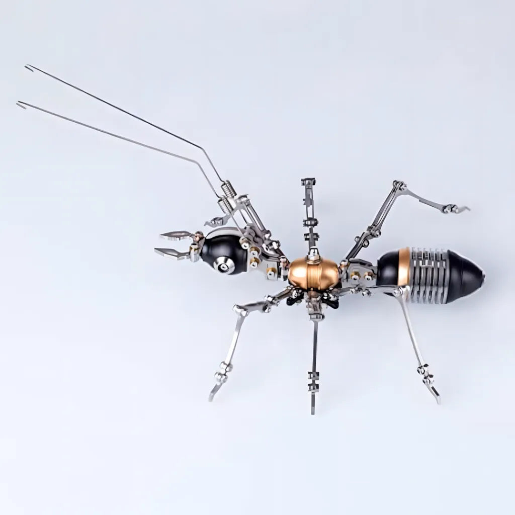 Top-down view of the black and gold mechanical ant, emphasizing its highly articulated legs and long antennae.