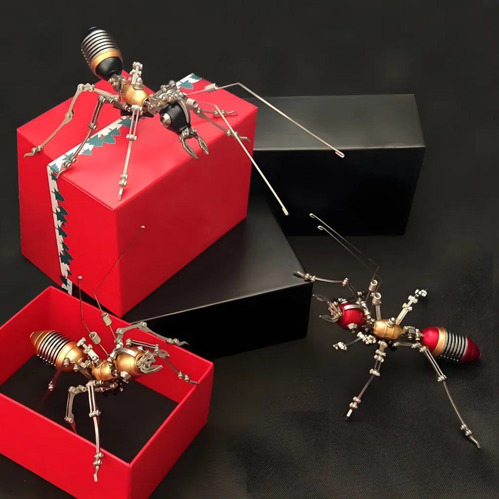 A set of three mechanical ant models (red and gold variants) placed next to gift boxes, showcasing the multiple color options