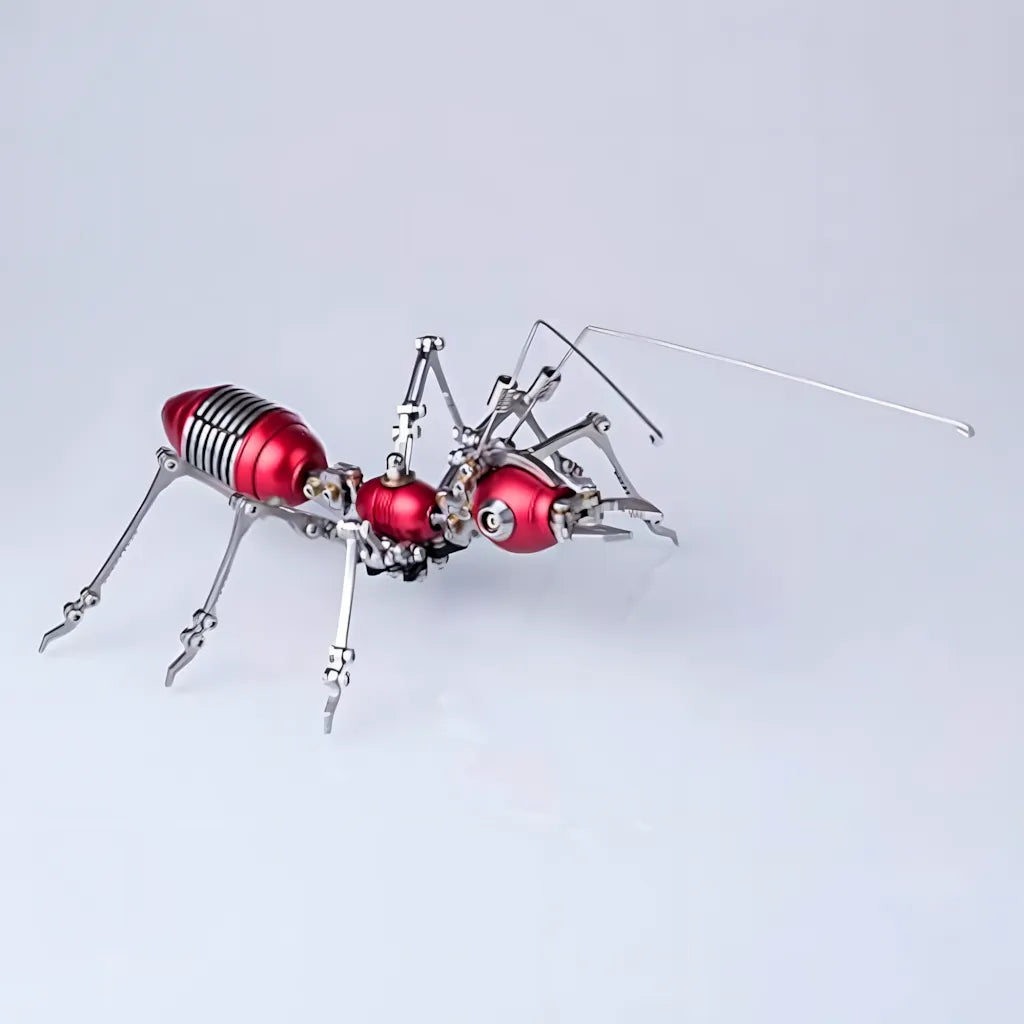 The red and gold variant of the Steampunk 3D Metal Puzzle ant model, showcasing the glossy red body segments and silver limbs