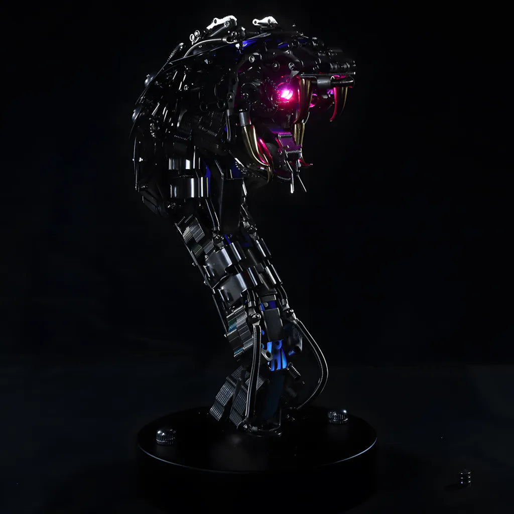 The Mechanical Cobra Head 'Viper's Bust' model on a black base, showcasing the glowing red eye and menacing posture.