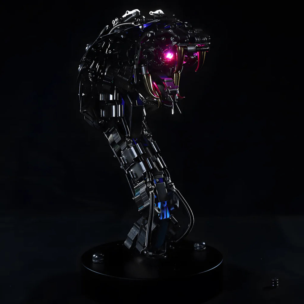 The Mechanical Cobra Head 'Viper's Bust' model on a black base, showcasing the glowing red eye and menacing posture.
