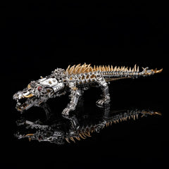 The Mechanical Crocodile 'The Leviathan', an expert-level DIY animal kit, shown from the side on a black reflective surface