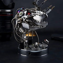 The Mechanical T-Rex Head 'Apex' placed on a desk next to a camera lens, showing its impressive scale and use as desk decor