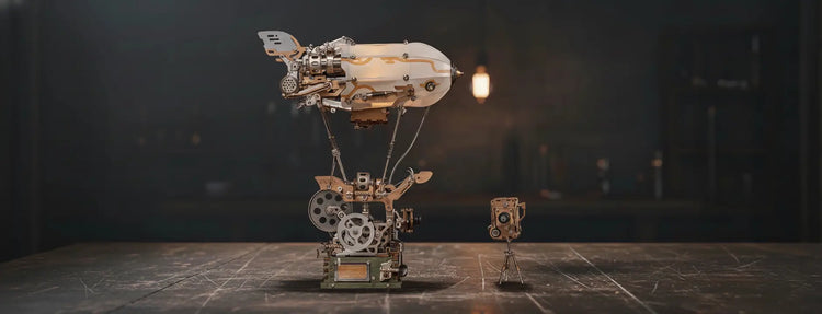 A steampunk airship model kit displayed in a dimly lit workshop, showcasing intricate brass gears and a vintage aesthetic.