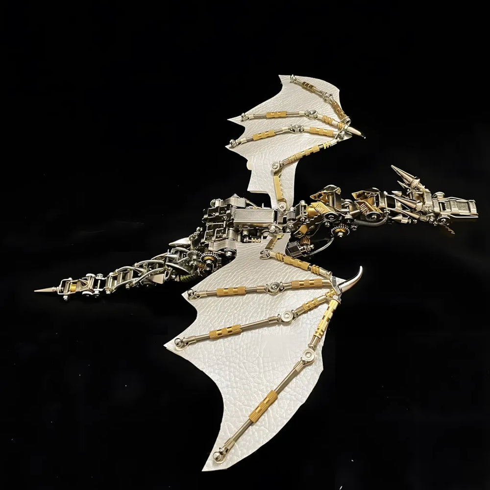 The robot dragon model with grey wings in a dynamic flying pose, highlighting the gold and silver mechanical bone structure
