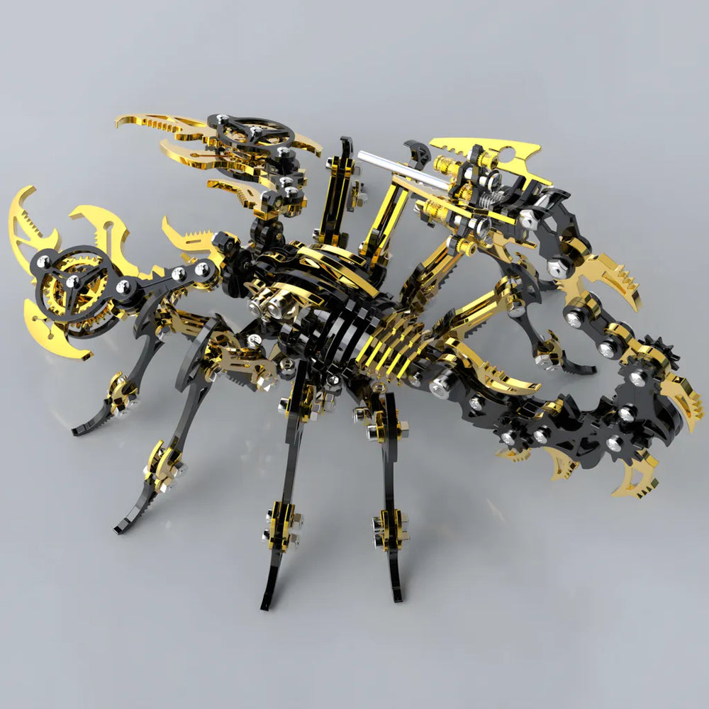 Top-down view of the black and gold mechanical scorpion, emphasizing its broad, armored body and the intricate claw design